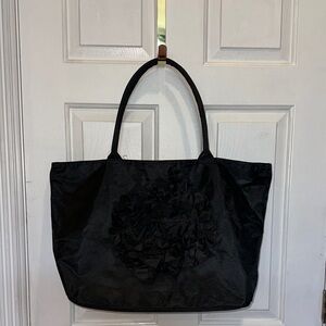 Murval Black Tote Bag with Black Flower Accent on front, zippered closing